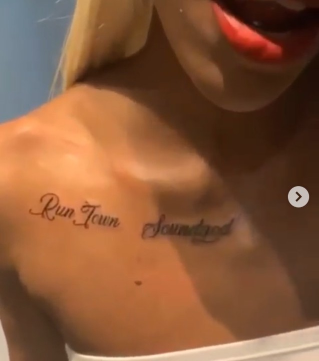 A Lady took to her social media platform to show the permanent tattoo on her body with Nigerian Singer “Runtown” name…