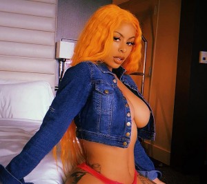Hip hop star Alexis Skyy attracts the attention of her fans with her sexy moves and with her sexy body. It is not enough for her to be a good performer, in order for her to be memorable, she needs to shake her awesome boobs and ass like a pro. We can check her out in many sexy outfits – the best one is see through and her dark nipples are poking through.