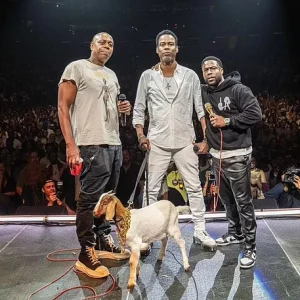 Kevin Hart Gifts Comedian Chris Rock A GOAT Called ‘Will Smith’ Live On Stage Four Months After Oscars Slap Drama 