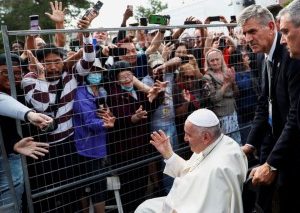 Pope has fun, security frets, as pontiff takes wheelchair detour