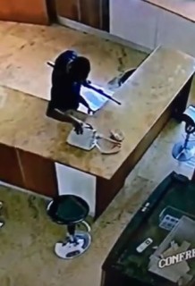 CCTV Captures Moment A Security Man Was Seen Stealing From a Bag